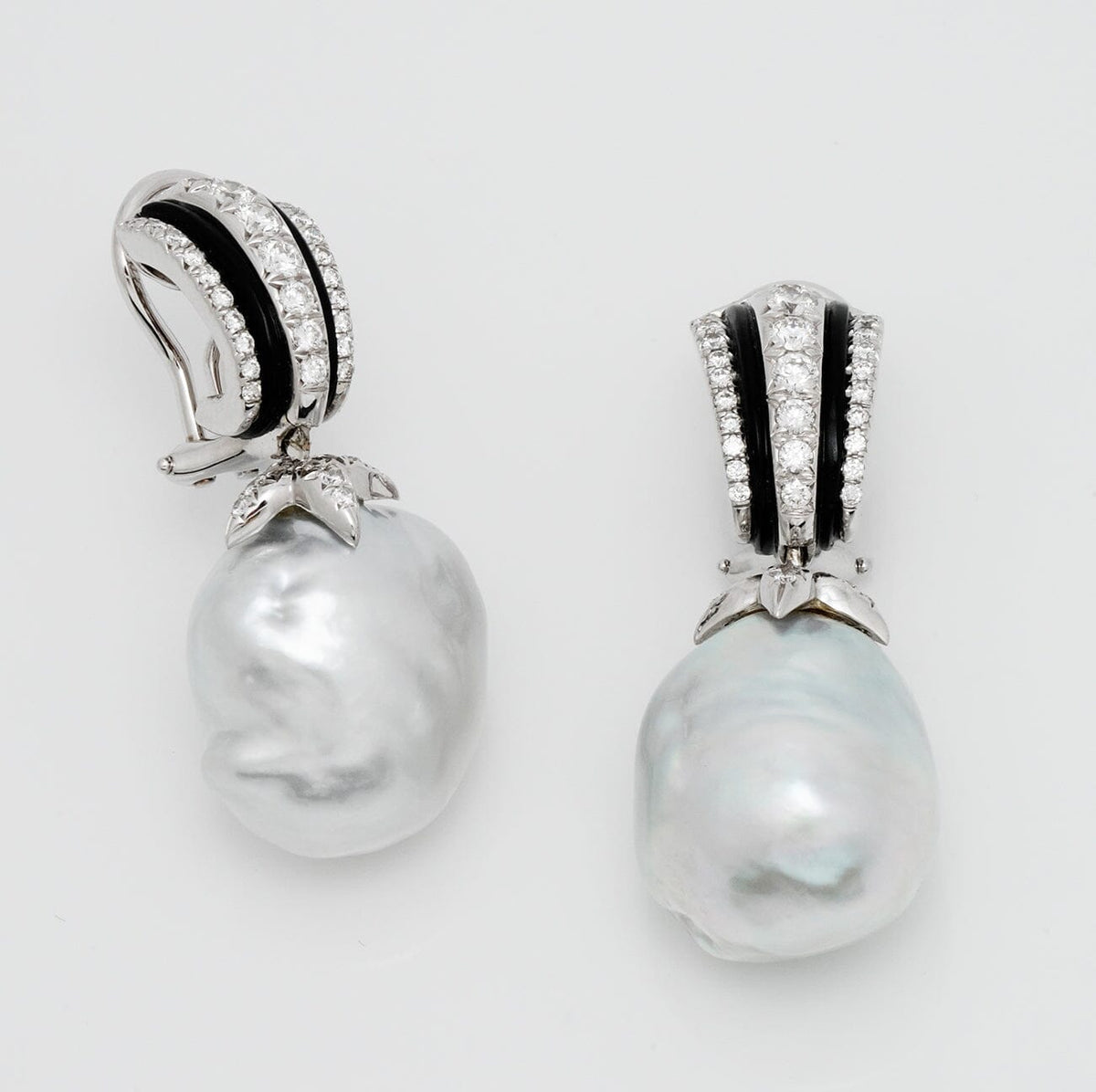 Assael Collection: 17.2 by 18.1 mm South Sea Pearl and Diamond Earrings featuring large white South Sea pearls with diamond and black enamel accents in elegant drop design.