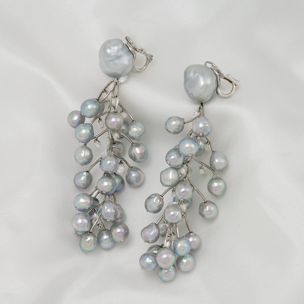 Baroque South Sea pearl, Akoya pearl, and diamond vine earrings
Clip-back earrings · 50 pearls · 15.49 ctw diamonds · 3.75 inches · platinum