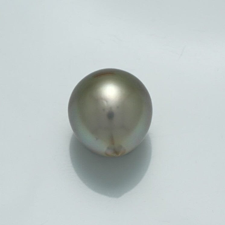 Single lustrous 12.3 x 10.9 mm Fijian Drop Pearl with smooth surface and subtle iridescent shades, perfect for elegant pearl jewelry designs.