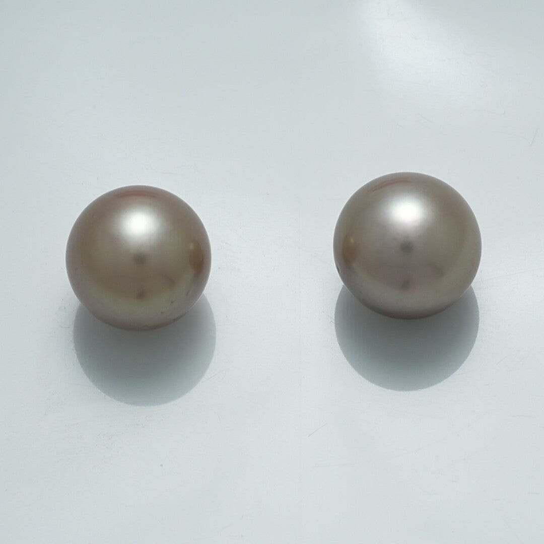 11.4 x 11.3 mm and 11.5 x 11.2 mm Fijian Pearl Pair with smooth, lustrous surface and soft grayish-white color, ideal for fine pearl jewelry collections.