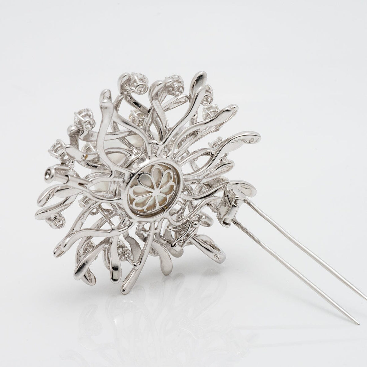 Assael Collection: 17.0 mm White South Sea Pearl and Diamond Brooch featuring intricate white gold design with diamonds surrounding a central white pearl, elegant and luxurious accessory.