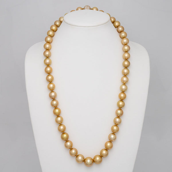 14.0–17.7 mm round golden South Sea pearl and diamond necklace on bust