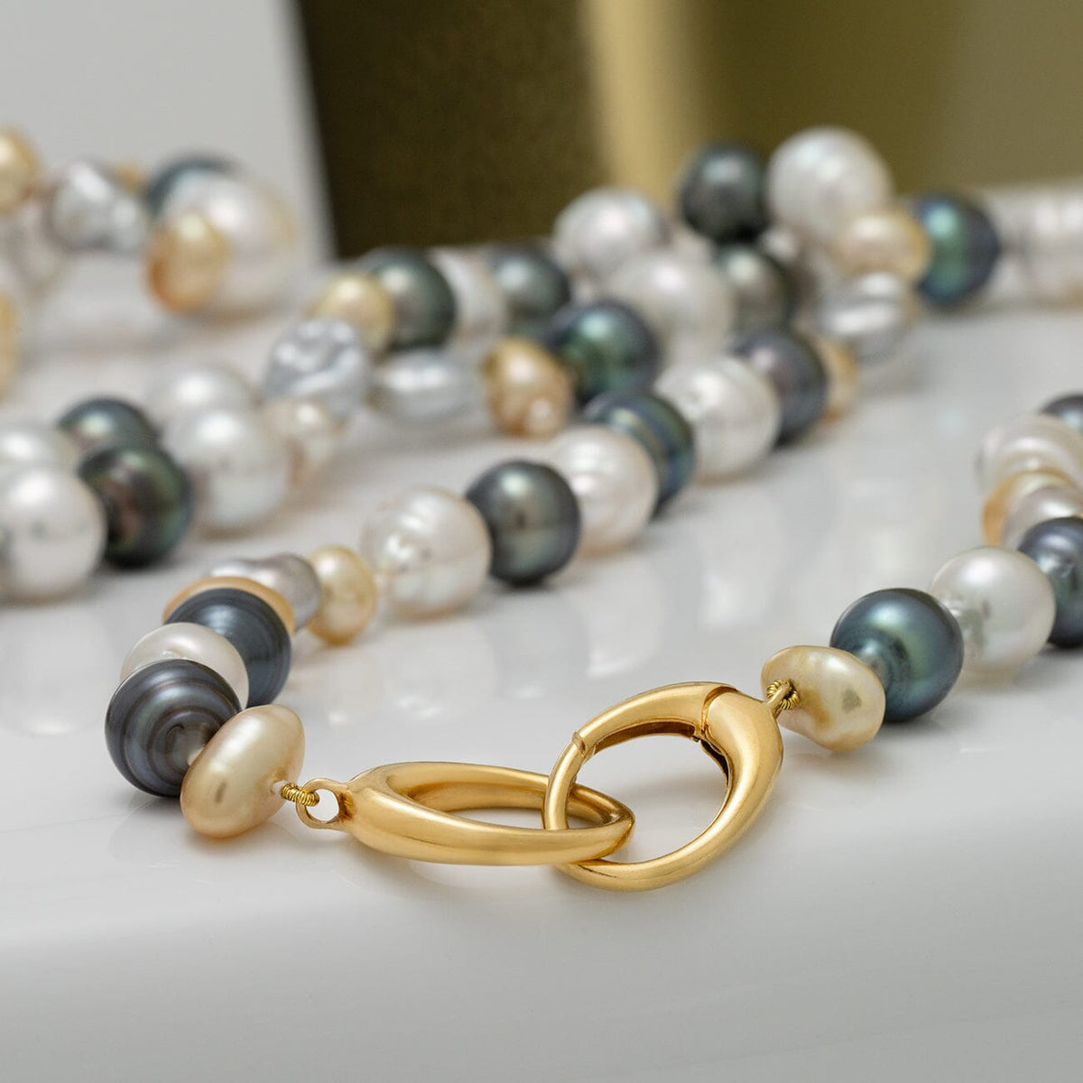 7.0–13.1 mm South Sea and Tahitian baroque & keshi pearl necklace with 18K Yellow gold orbit clasp