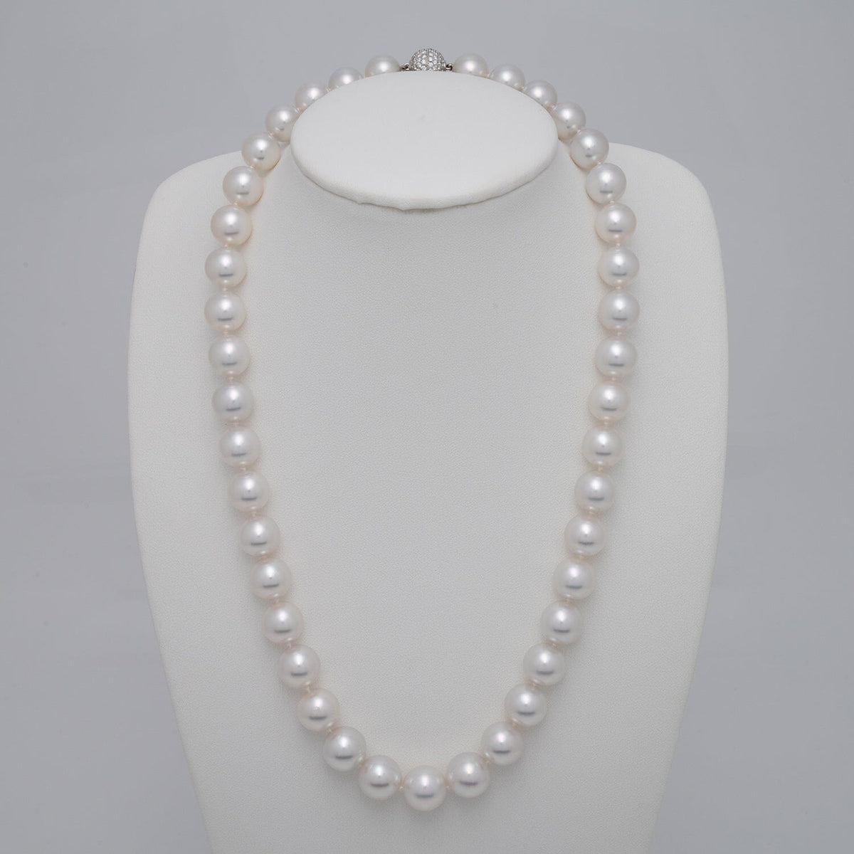 10.0–12.0 mm round South Sea pearl and diamond necklace on bust