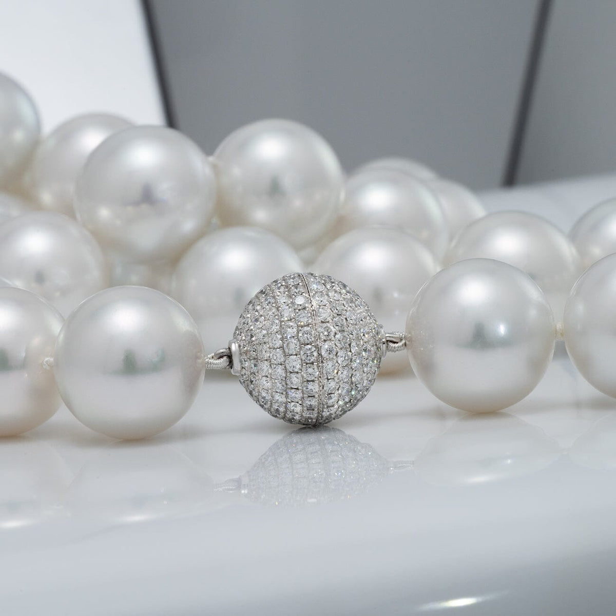 47 round South Sea pearls · approx. 32.25 inches · 18K white gold diamond ball clasp (244 diamonds, 3.40 ctw)