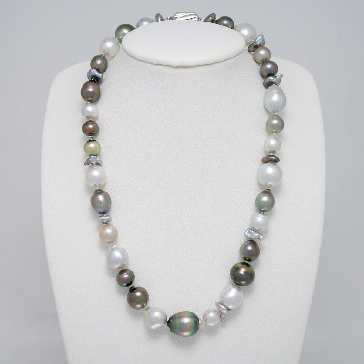 8.0-15.0 mm Baroque and Keshi South Sea and Tahitian Pearl Necklace on a dark background