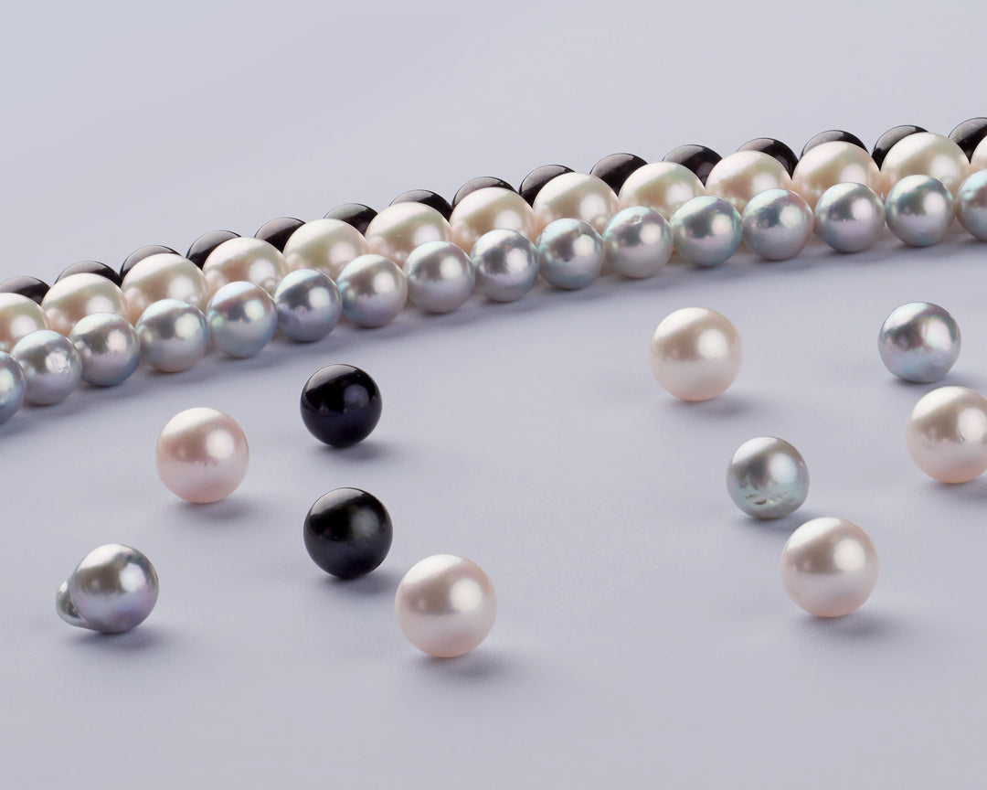 Various akoya pearl colors including dyed black and natural blue