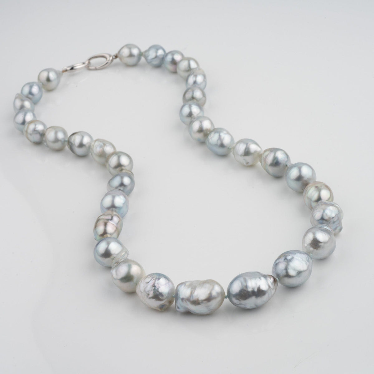 Assael Collection: 11.0-14.0 mm Fijian Pearl Baroque Necklace with lustrous, irregularly shaped pearls in soft silver and gray hues, showcasing elegant natural beauty.