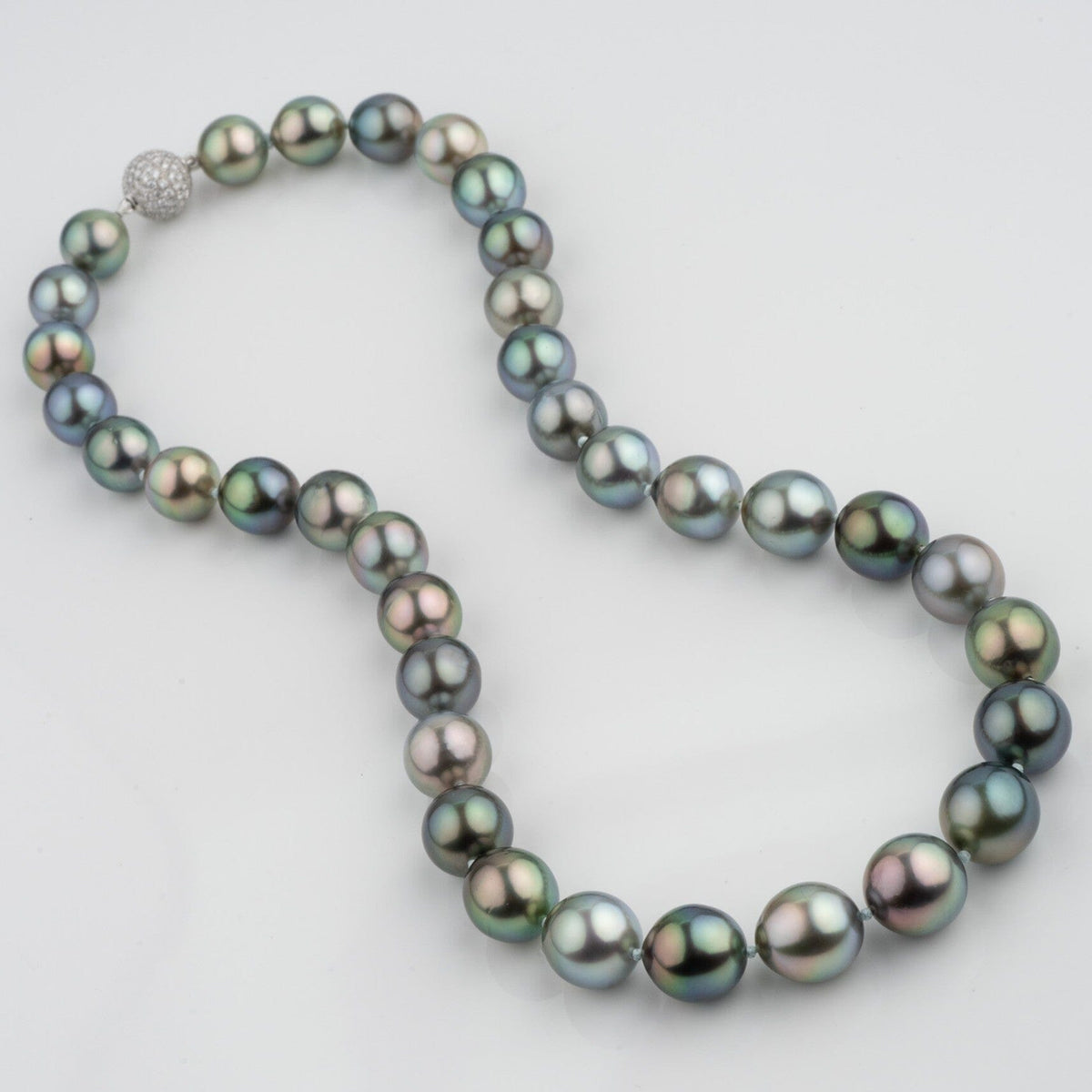 Assael Collection: 10.0–11.7 mm Fijian Pearl Necklace featuring a strand of lustrous, multi-colored Fijian pearls with a sparkling clasp, showcasing exquisite cultured pearl craftsmanship.