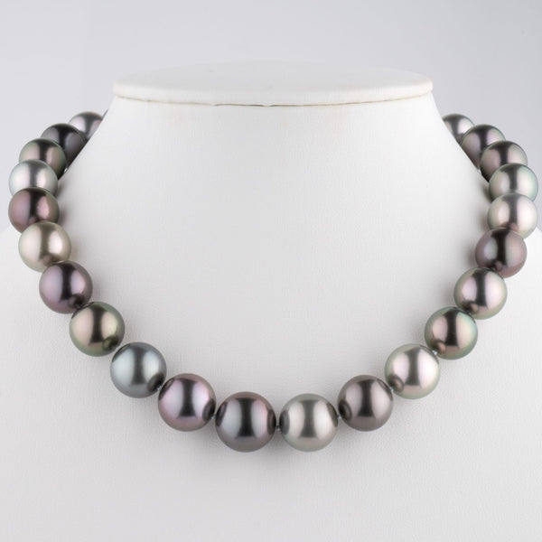 One-of-a-kind multicolor Tahitian pearl necklace, 29 round pearls 13.0–15.5 mm, 28.9 momme. Rare natural colors, 18k WG clasp with 2.30 ct diamonds.