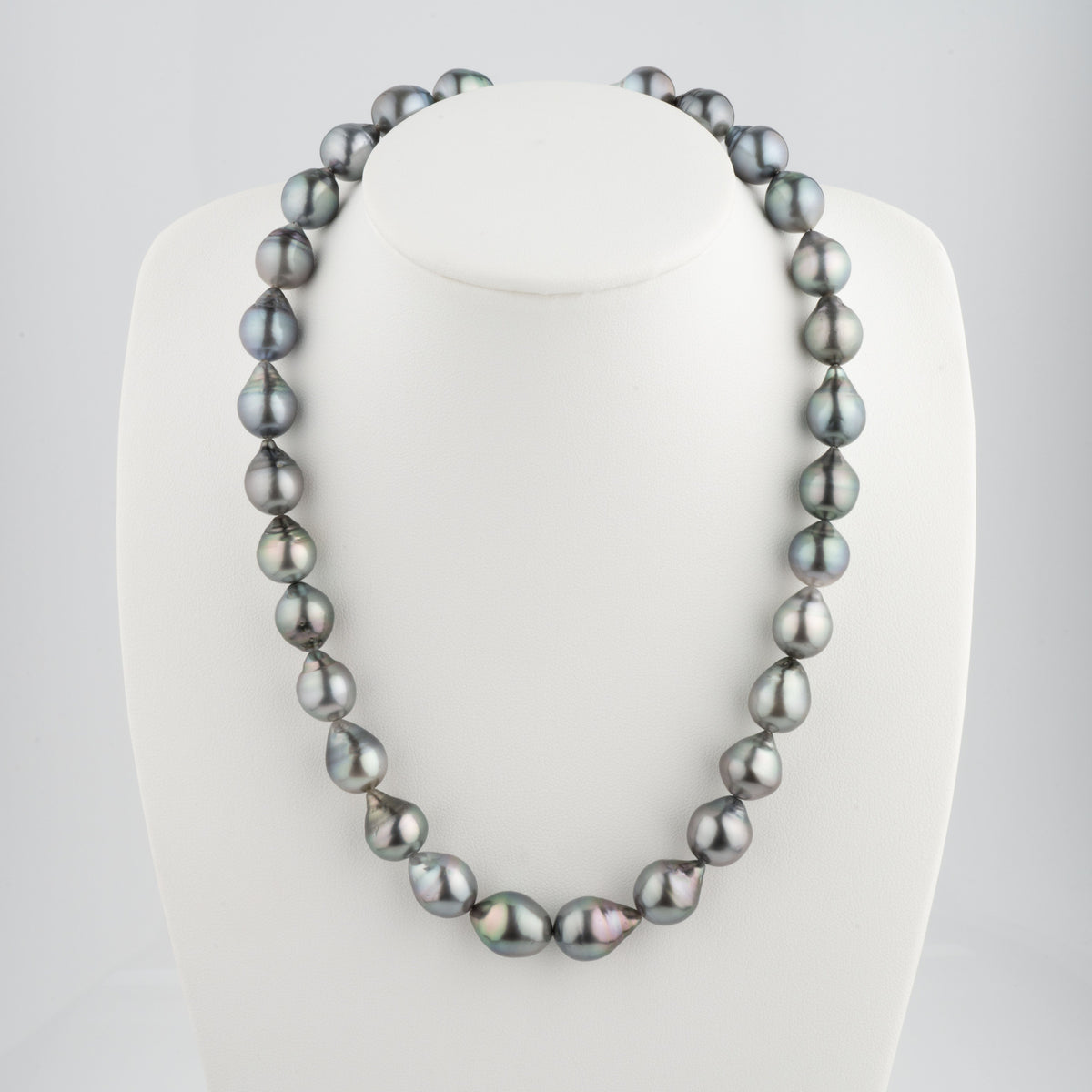 10.2-12.2 mm AA+/AAA Tahitian Drop Pearl Necklace displayed on a white bust, featuring lustrous drop-shaped black tahitian pearls with subtle iridescent hues.