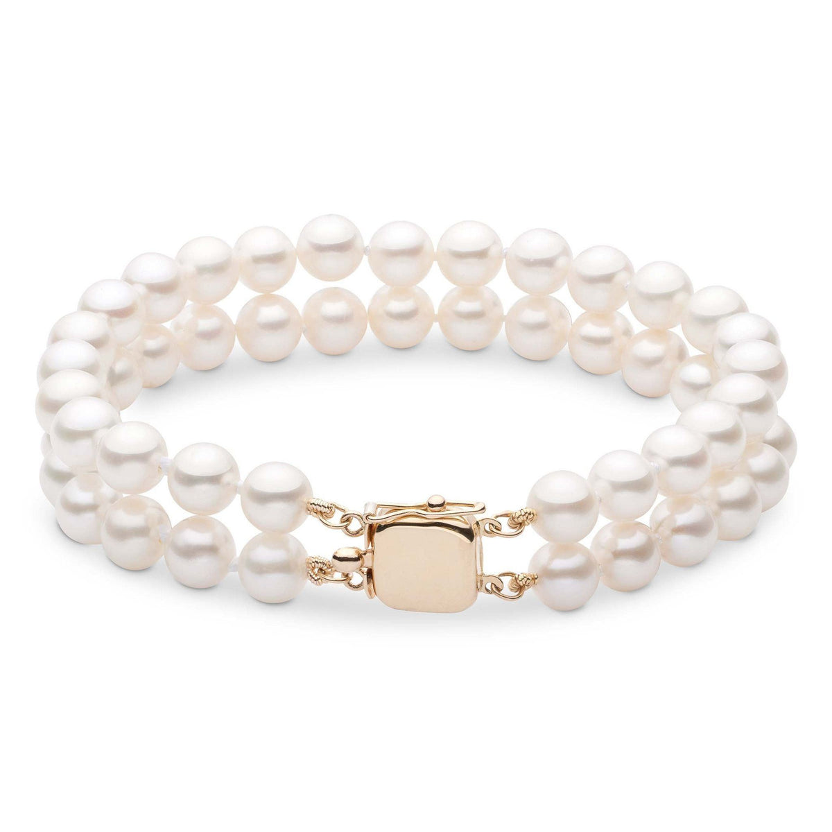 A double strand bracelet of white freshwater pearls with a yellow gold clasp