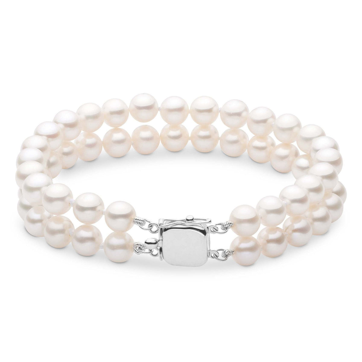 A double strand bracelet of white freshwater pearls with a gold clasp
