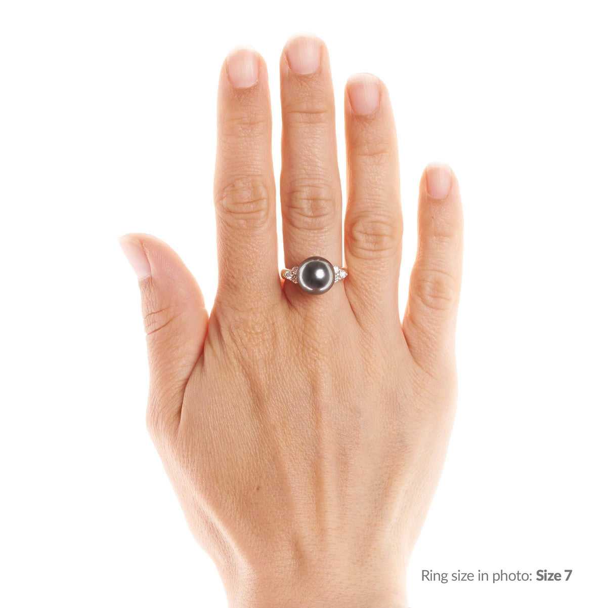 Hand wearing the Always Collection 11.0-12.0 mm Tahitian Pearl and Diamond Ring featuring a lustrous black tahitian pearl set in a silver band accented with small diamonds.