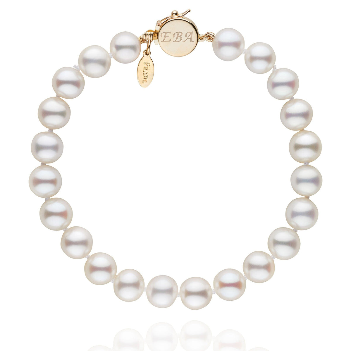 Personalized 7.5-8.0 mm White Freshadama Freshwater Pearl Circle Clasp Bracelet featuring lustrous white freshwater pearls with a polished gold circle clasp and a custom engraved charm.