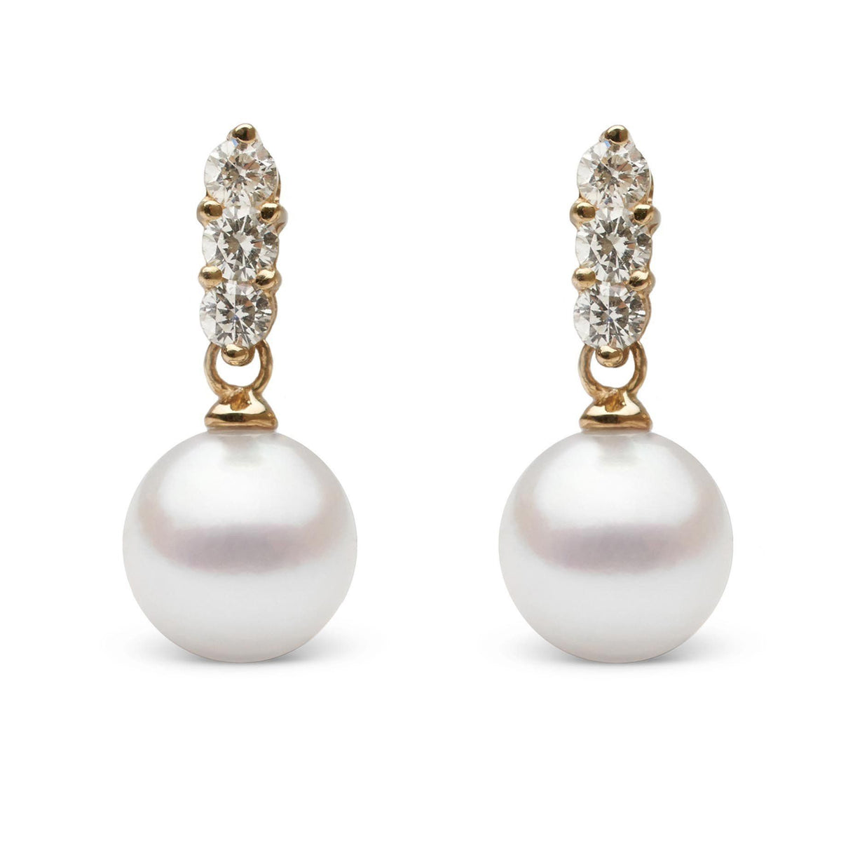 Trio Collection 8.0-8.5 mm Akoya Pearl and Diamond Earrings featuring white akoya pearls suspended from gold settings accented with sparkling round diamonds.