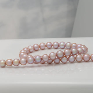10–11 mm lavender Freshadama pearl strand with high luster freshwater pearls
