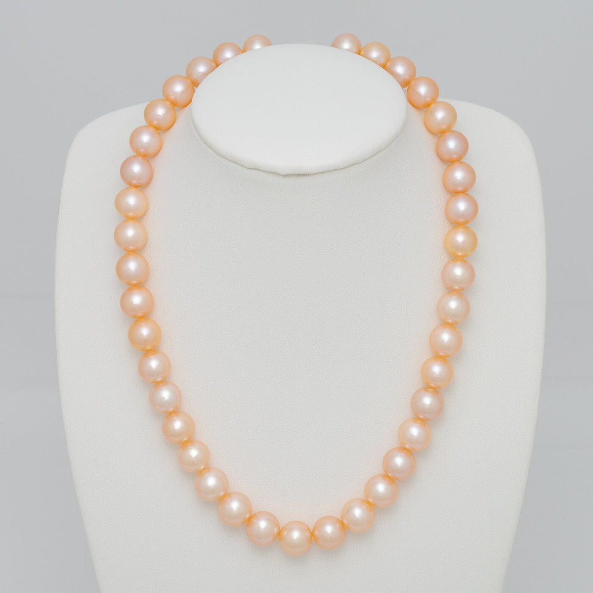large pink to peach freshwater pearl necklace featuring Freshadama pearls
