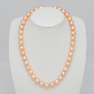 large pink to peach freshwater pearl necklace featuring Freshadama pearls