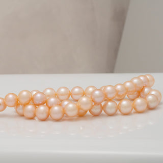 10–11 mm pink and peach Freshadama pearl strand with high luster