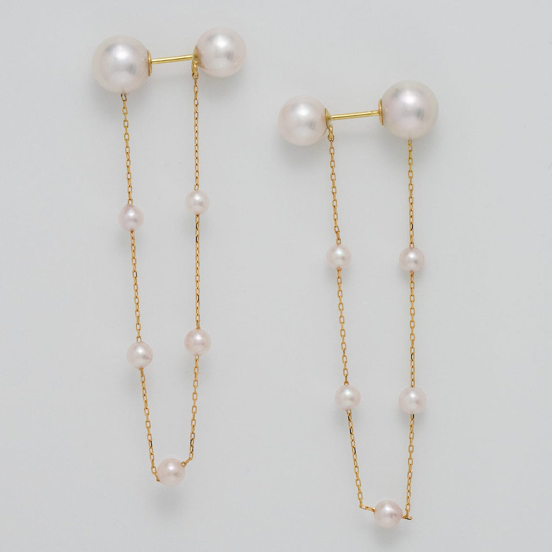Takahashi: 3.0-7.0 mm Akoya Pearl Earrings featuring elegant white akoya pearls on delicate gold chains with a modern and refined design.