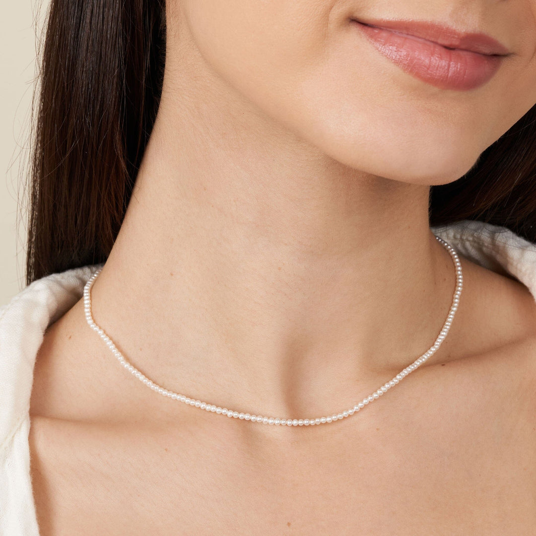 2.0-2.5 mm AA+ Freshwater Pearl Necklace - 16 Inch on model