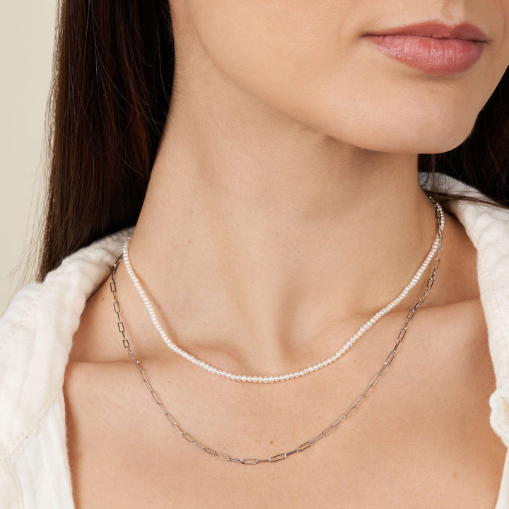 2.0-2.5 mm AA+ Freshwater Pearl Necklace with Paperclip Chain Set - White Gold, 16 Inch on model