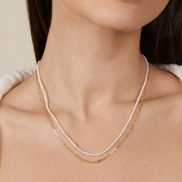 2.0-2.5 mm AA+ Freshwater Pearl Necklace with Paperclip Chain Set - Yellow Gold, 18 Inch on model
