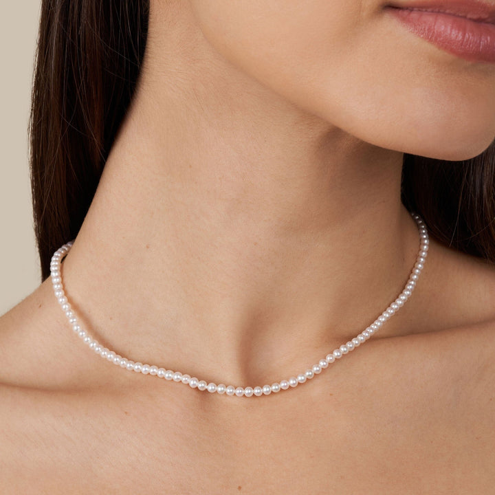 3.0-3.5 mm AAA Freshwater Pearl Necklace - 16 Inch on model
