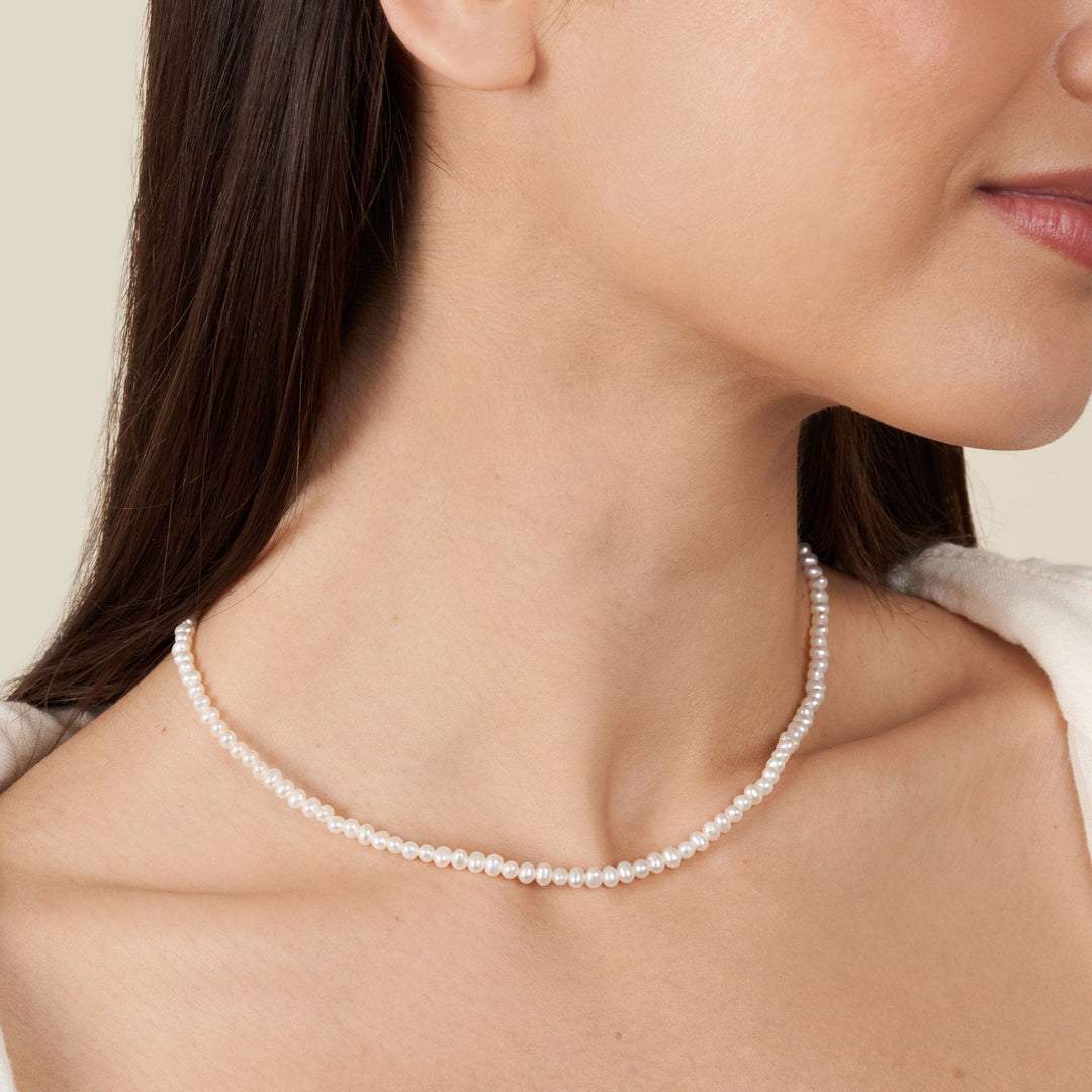 3.5-4.0 mm AA+ Freshwater Pearl Necklace - 16 Inch on model