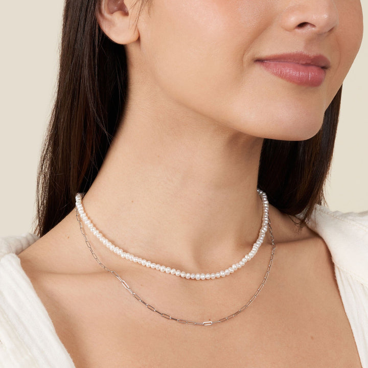 3.5-4.0 mm AA+ Freshwater Pearl Necklace with Paperclip Chain Set (White Gold and 16 Inch) on model