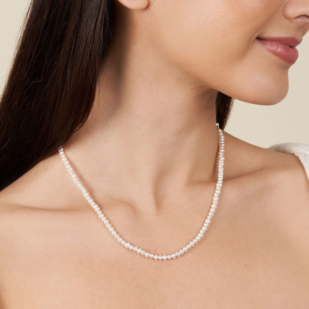 3.5-4.0 mm AA+ Freshwater Pearl Necklace - 18 Inch on model