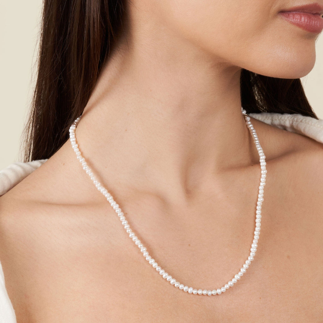 3.5-4.0 mm AA+ Freshwater Pearl Necklace - 20 Inch on model