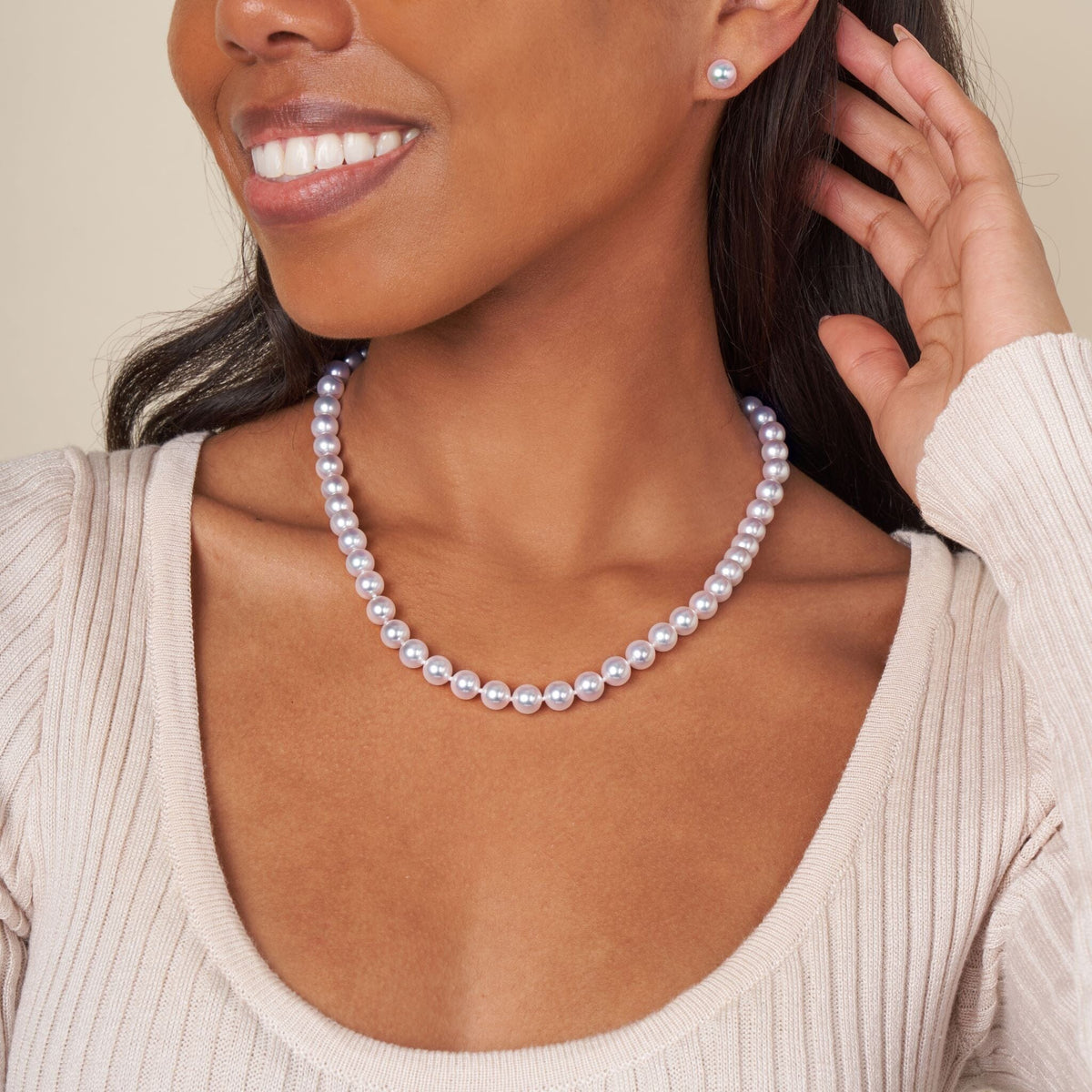 7.5-8.0 mm 18 inch White Hanadama Akoya Pearl Necklace on model