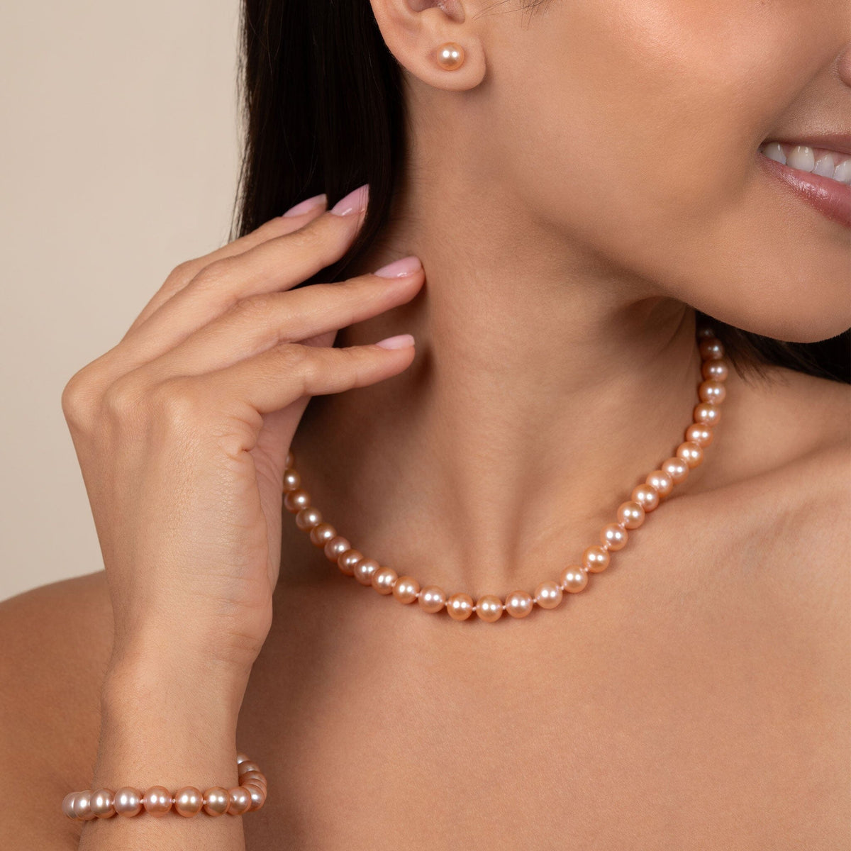 3-Piece Set of 7.5-8.0 mm AAA Pink Freshwater Pearls 16 inch on model