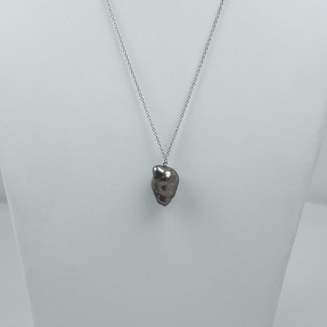 K4: 10 x 14.2 x 8.8 mm Tahitian Keshi Pearl Pendant, 14k WG, 16-18 adj, featuring a unique dark Tahitian Keshi pearl on a delicate white gold chain.