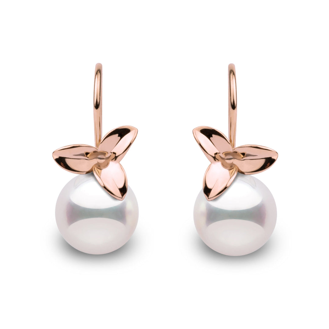 Elegant 14k gold earrings featuring 9–9.5 mm white Akoya pearls with mirror-like luster and floral-inspired design in rose gold.