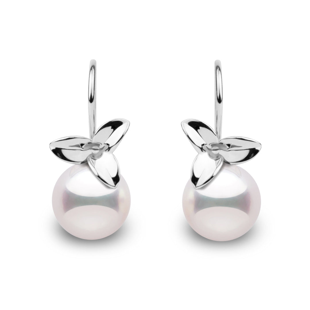 Elegant 14k gold earrings featuring 9–9.5 mm white Akoya pearls with mirror-like luster and floral-inspired design in white gold.