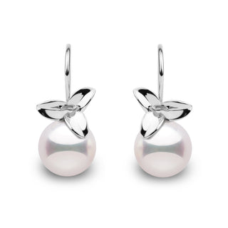 Elegant 14k gold earrings featuring 9–9.5 mm white Akoya pearls with mirror-like luster and floral-inspired design in white gold.