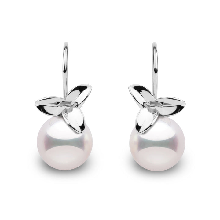 Elegant 14k gold earrings featuring 9–9.5 mm white Akoya pearls with mirror-like luster and floral-inspired design in white gold.