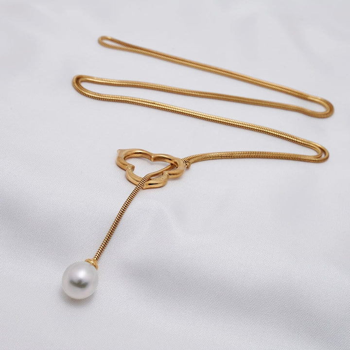 Angela Cummings for Assael white South Sea pearl lariat necklace
18K yellow gold lariat · approx. 34 inches · 12.2 × 10.9 mm white South Sea drop pearl