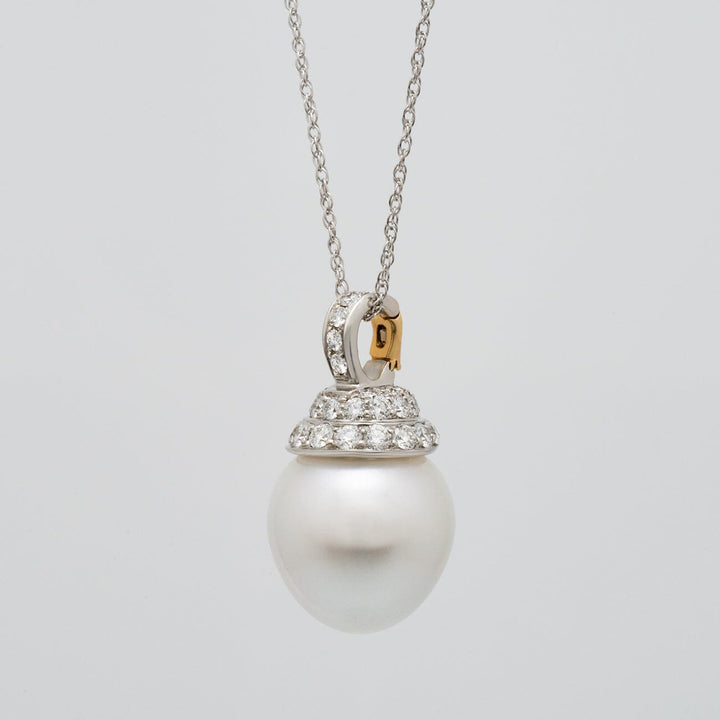 Assael Collection: 16.2 x 17.3 mm South Sea Pearl and Diamond Pendant Enhancer featuring a large white south sea pearl with a diamond-studded cap on a delicate chain