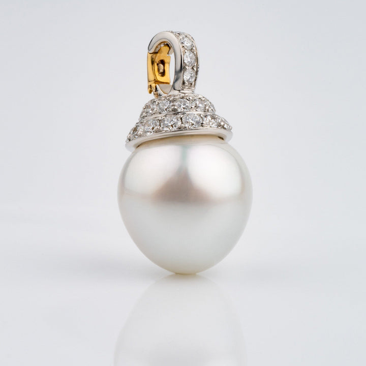 Assael Collection: 16.2 x 17.3 mm South Sea Pearl and Diamond Pendant Enhancer featuring a large white South Sea pearl accented with a diamond-studded gold setting.