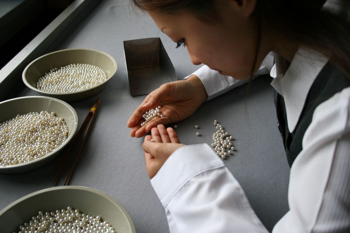 After harvest, pearls are hand-sorted for size, color and quality