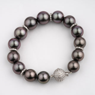 Assael Collection: 10.9–13.1 mm Tahitian Pearl and Diamond Bracelet featuring large dark Tahitian pearls accented with sparkling diamond separators and a diamond-encrusted clasp.