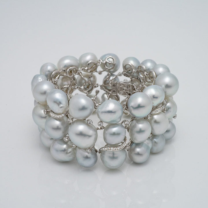 Assael Collection: 10.0–13.0 mm Baroque White South Sea Pearl Bracelet featuring lustrous irregular-shaped white pearls strung together with silver accents for an elegant, sophisticated look.