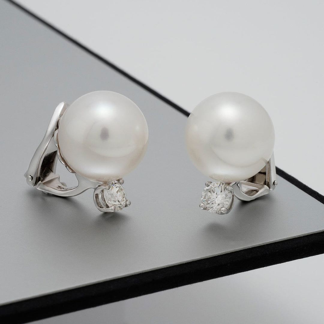 White South Sea pearl and diamond clip earrings
13.5 × 13.5 mm round pearls · 18K white gold · 2 diamonds (0.83 ctw) · clip backs