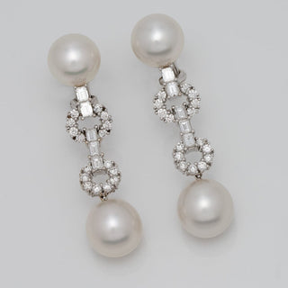 Assael Collection: 10.8-12.7 mm White South Sea Pearl and Diamond Dangle Earrings featuring large lustrous pearls and intricate diamond accents in a sophisticated design.