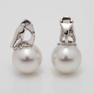 Assael Collection: 11.9 mm South Sea Pearl Earrings featuring large round white pearls with elegant 14K white gold clasps, showcasing fine cultured pearls with a smooth, lustrous surface.