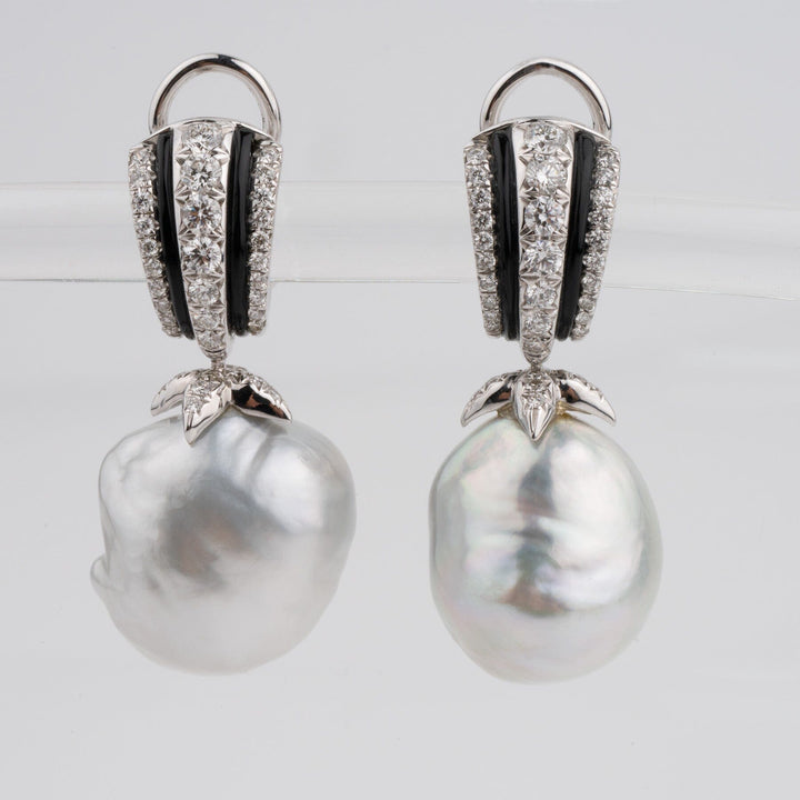 Assael Collection: 17.2 by 18.1 mm South Sea Pearl and Diamond Earrings featuring large baroque pearls set with sparkling diamonds and detailed silver accents.